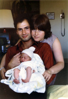 My parents and I the day I was born.