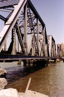 The Amtrak bridge heads north towards Riverdale along the east bank of the Hudson River. It sits at the confluence of the Harlem and Hudson Rivers.