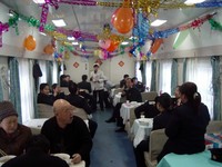 New Year's morning party in the dining car. Mostly train staff, but they were happy to give me a traditional New Year's breakfast of dumpling soup.