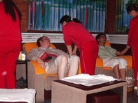 We all went to get foot massages after celebrating Small David's birthday. The team of masseuses in red jumpsuits did a pretty good job. Big David and Lincoln look like they're enjoying themselves, no?