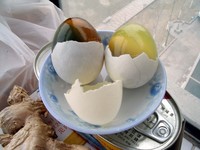 Supposedly what Lincoln had bought was some variant of "1,000-year old eggs" which are slow-cooked to a jelly-like state underground.