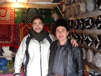 Lincoln bought a rug "Made as Turkey" from this guy in Korla's Uyghur market.