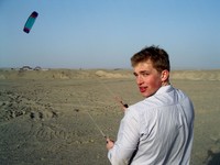 William flies his wind-surfing kite way, way, way on the outskirts of Korla. I also gave it a try.