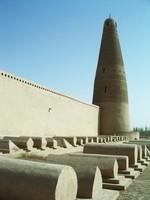 Looking at the minaret from behind the Emin Ta mosque. Those are graves in the foreground.