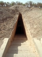 Descending, alone, into a spooky cave-grave.