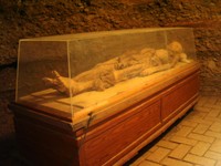 A wider view of a mummy at Astana.