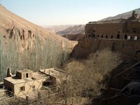 The caves at Bezeklik are nestled onto the side of a cliff in the Flaming Mountains.