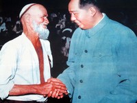 Mao Zedong with a very famous Uyghur. Supposedly this old man rode his donkey all the way from Kasghar to Beijing to personally thank Mao for liberating China.