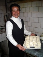 Wang Laoshi, a good friend and the proprietor of Korla's finest tea house, shows off her dumpling skills.