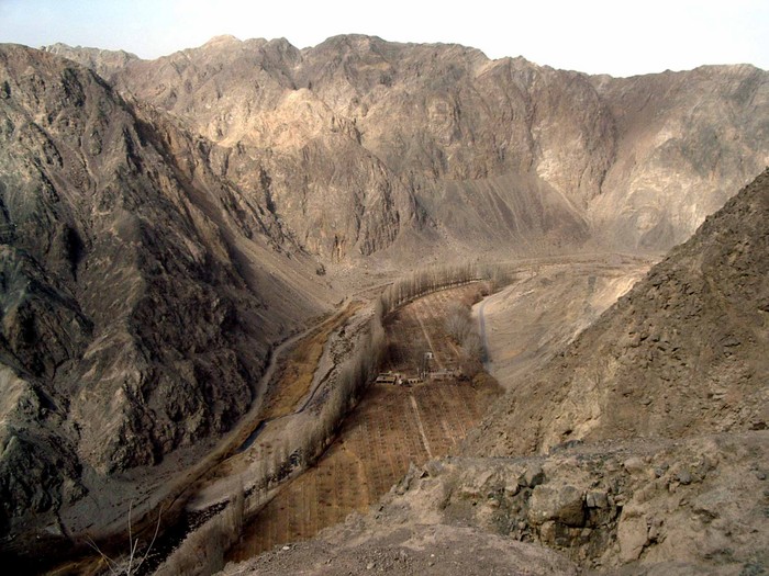 It's called "The Iron Gate" because Silk Road traders and travellers had no choice but to pass between these two well-defended mountains. The dirt path along the left bank of the river is part of the actual Silk Road.
