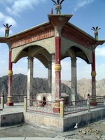 These graves are part of a famous Uyghur story. A long time ago, there was a princess, Tzuohla, who loved a simple shepherd, Tayir, much to her father's dismay. Her father, the king, arranged for her to marry a prince, so she ran off on a horse with her lover. The king sent troops to pursue them, and while crossing over these mountains they fell to their deaths.
