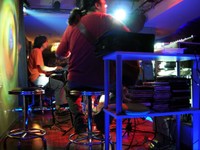 Wang Qi (foreground) and his band play at Korla's 1-2-3 Bar, more famously know as the location of my iPod DJ gigs.