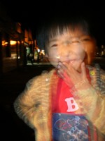 The daughter of the restaurant owner I stayed with in Hongqi. She couldn't stand still long enough for a clear shot. I happen to like this "night portrait" effect, however.