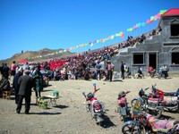 In my quest for Kazakh handicrafts (ultimately unsuccessful), I somehow ended up at something like a Kazakh Woodstock at Hong Hu Shan (Red Lake Mountain). Nice place for a concert.