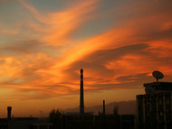 A magically splendid cloud outside my apartment window, at sunset.