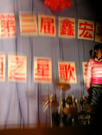 Talent shows are awesome! That's why I couldn't turn down an invite to hear teenagers sing Chinese pop songs at the Railway Middle School.