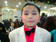 I attended my first Uyghur hatmatoi (circumcision party) courtesy of this young fellow and his newly modified member.
