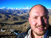 For my father, here's the required self-portrait in front of the Himalayas. The mountain all the way to the left is Everest; the one partially obscured by my big head is Cho Oyu.