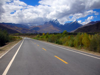 Heading west out of Lhasa, with the twin peaks of Karachowo and Karchomo in the distance. (They represent a husband and wife in some Tibetan story.)