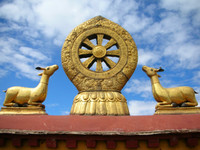 I imagine that the Israelites were worshipping something like this when Moses came down from Mt. Sinai and got angry with them. Ornamentation atop the Jokhang Temple.