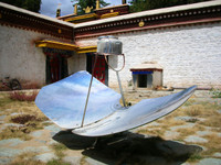 With the sun as powerful as it is in Tibet, a parabolic reflector has no problem bringing a kettle to a boil. Norbulingka Summer Palace, Lhasa.