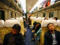 We boarded the train to Tibet in Golmud at 4:15 am. Most people were still sleeping. Check out the plush upholstery and carpeting... not bad for "hard seat", the lowest class on Chinese trains.