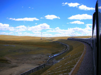 The train to Lhasa passes through Tibetan grasslands.