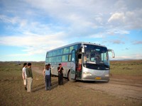 Our sleeper bus pauses for a morning bathroom break (not that there was a bathroom) in the middle of nowhere AKA the Junggar Basin. Lincoln, Xiao David, and Carrie stretch their legs.