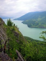Three-quarters of the way up the mountain, I snapped this shot of Kanas Lake. Good thing, too, because the clouds soon came back to block the splendid view.