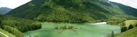 Hooray for "panorama mode" on my new digital camera. This is a three-photo shot of Dragon Bay on ther Kanas River. Look at that island of trees and use your imagination... the dragon's tale goes off to the right.