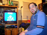At home with his machines: my friend, Chris Holcomb, the video-game fiend.