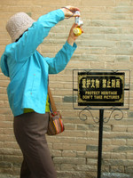 Why does taking photos damage a nation's cultural heritage? Or, better yet... why do the Chinese bother printing signs? Taken inside the fortress at Jiayuguan, Gansu Province.