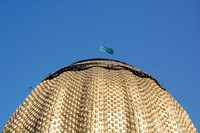We're not in China anymore! The Kazakh flag flies high in Almaty.