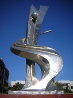 This statue of an "H" and an "S" intertwined stands in front of the school at which I currently teach, Hua Shan Middle School.