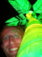 Daniel gets up-close and personal with a psychedelic neon palm!