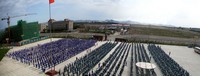 Simon went away for a week to fetch his wife, so I covered some classes for him at Hua Shan High School. I took this panorama shot of their awesomely gigantic morning exercises.