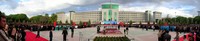 A panorama of Korla's People's Square, National Day, October 1, 2005. Simon appears on the left edge of the photo.