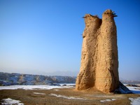 The Kizilgish Beacon Tower... an ancient military outpost standing high over the bed of the Kuqa River.