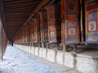The Labrang Monastery is surrounded on all sides by walls covered in prayer wheels, kept spinning by pious pilgrims.