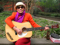 This rockin' old woman was happily strumming away in a park at Wuhou Temple. Unfortunately, her strumming was just that... I don't think she could even play a single chord.