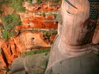 Bam! This buddha measures in at 71 meters (233 feet) tall. It's the largest stone statue of the Buddha in the world.