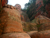 Looking up from below at the Leshan Giant Buddha. Those two objects at the very bottom of the photo are (L to R) the Buddha's right foot's fourth and third toes (with toenails).