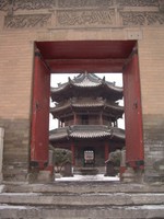 Looking through a gate towards the minaret of Xi'an's famous Great Mosque.
