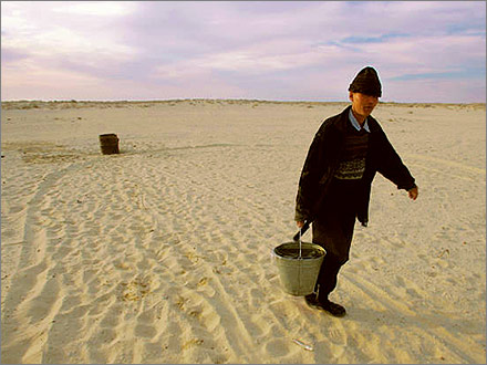 Fetching water from a desert well.