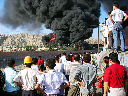 Photo of a tire fire burning in Korla, Xinjiang on July 30, 2007.