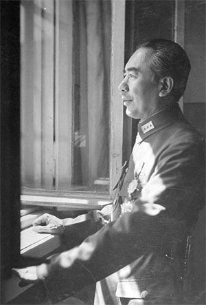 Governor Sheng Shih-Tsai looking out window.