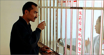 Almijan takes methadone at Yuandong Hospital in Kashgar. He says he has tested negative for H.I.V. 2006/11/12 NY Times.
