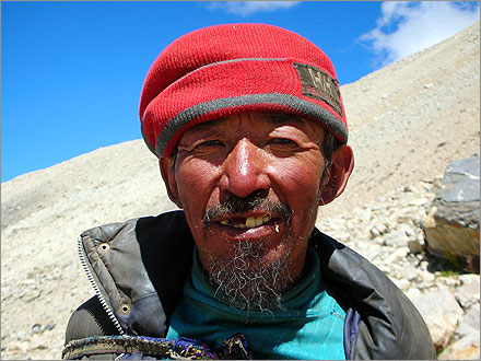 A Tibetan yak herder. He made me give him some potatoes and a chicken sausage to take this photo.